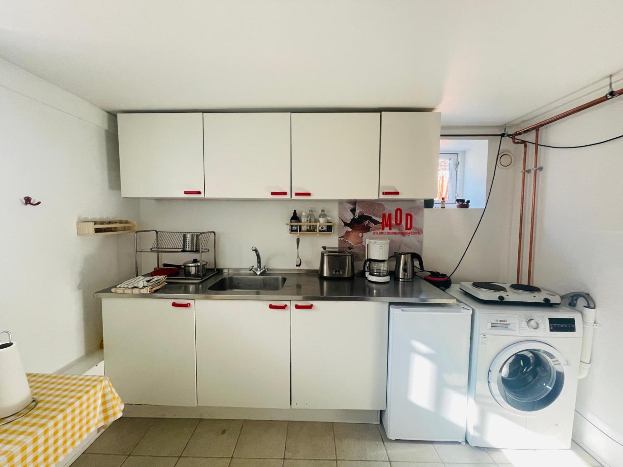 Appartement Charmerende Kaelderlejlighed I